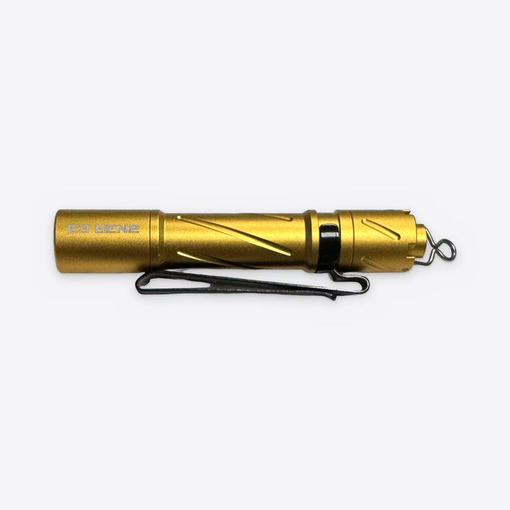 E3 GEN2 compact AAA flashlight in Gold